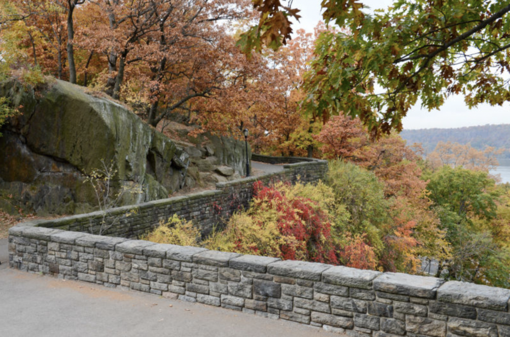 Fort Tryon Park walk way over Hudson | Where to See Fall Foliage In and Around New York City