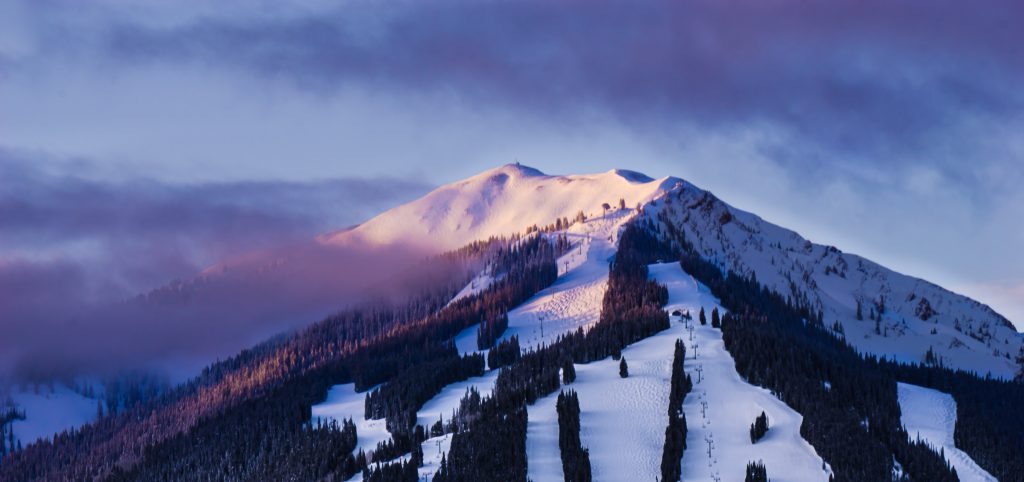 Aspen Mountain covered in snow in Aspen Colorado | Best Places to Travel in the US in the Winter