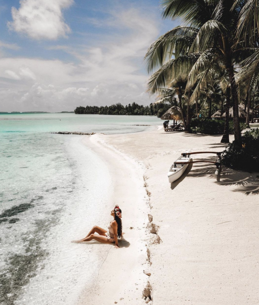 Christina on beach in Bora Bora | The Ultimate Bora Bora and Moorea travel guide