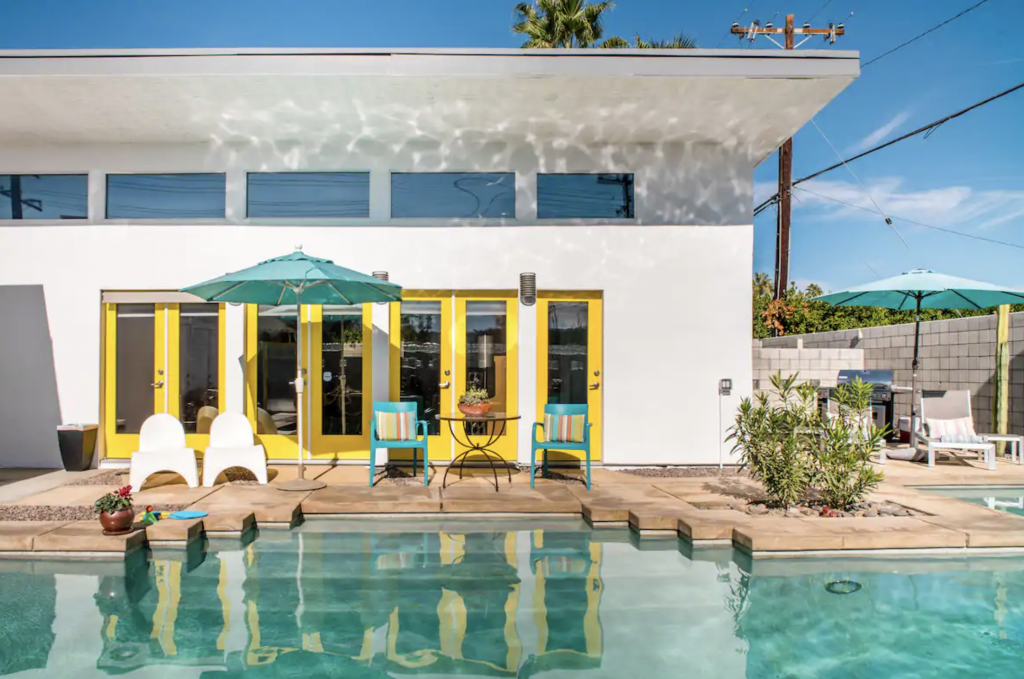 Yellow and blue palm springs airbnb exterior