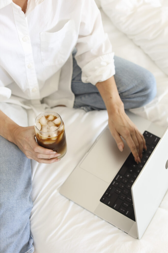 Woman on laptop researching how the Instagram Reels and TikTok algorithm works